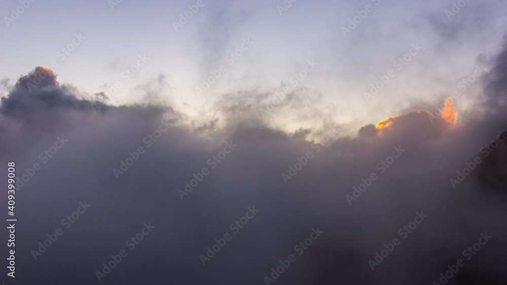 Evening Clouds Hover Over the Mountains. Sunset in the Mountais Evening Clouds Hover Over the Mountains. Sunset in the Mountais