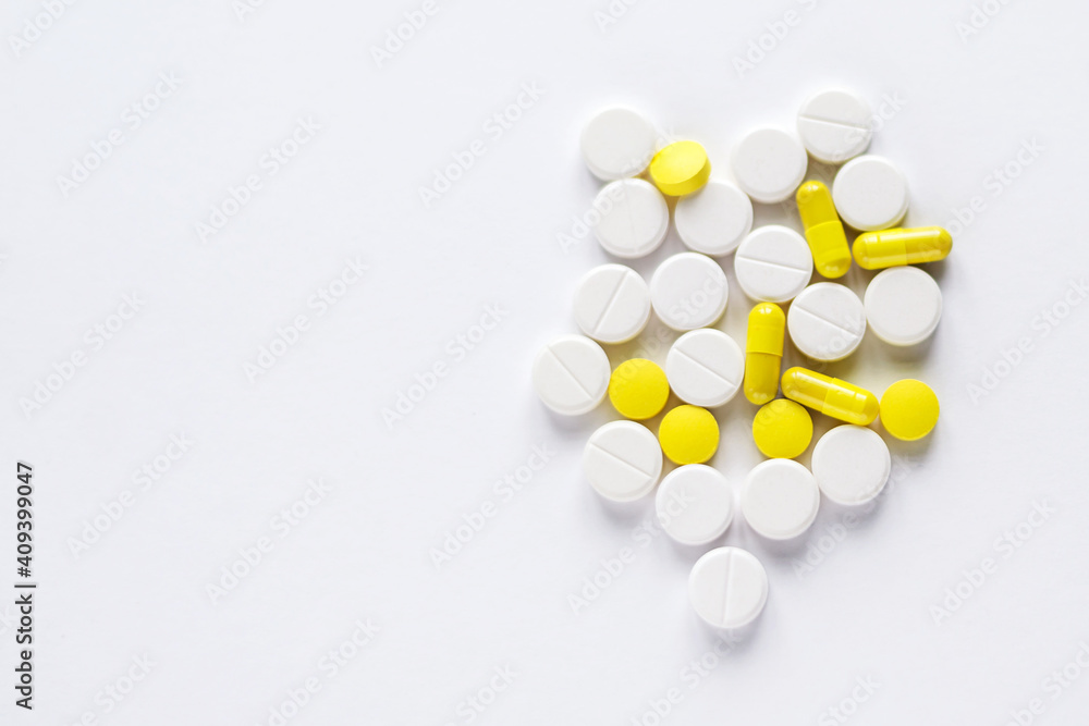 white pill smedicine macro - medical background, closeup of yellow, white pills white pill smedicine macro - medical background, closeup of yellow, white pills