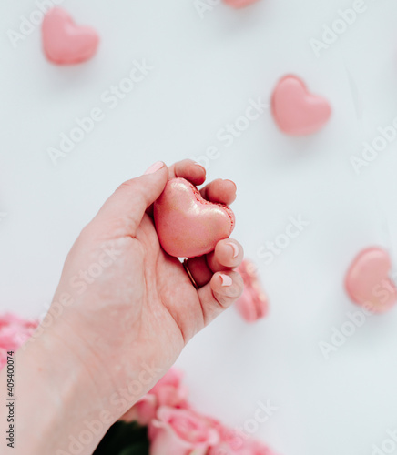 Heart shaped macaroon on a white background