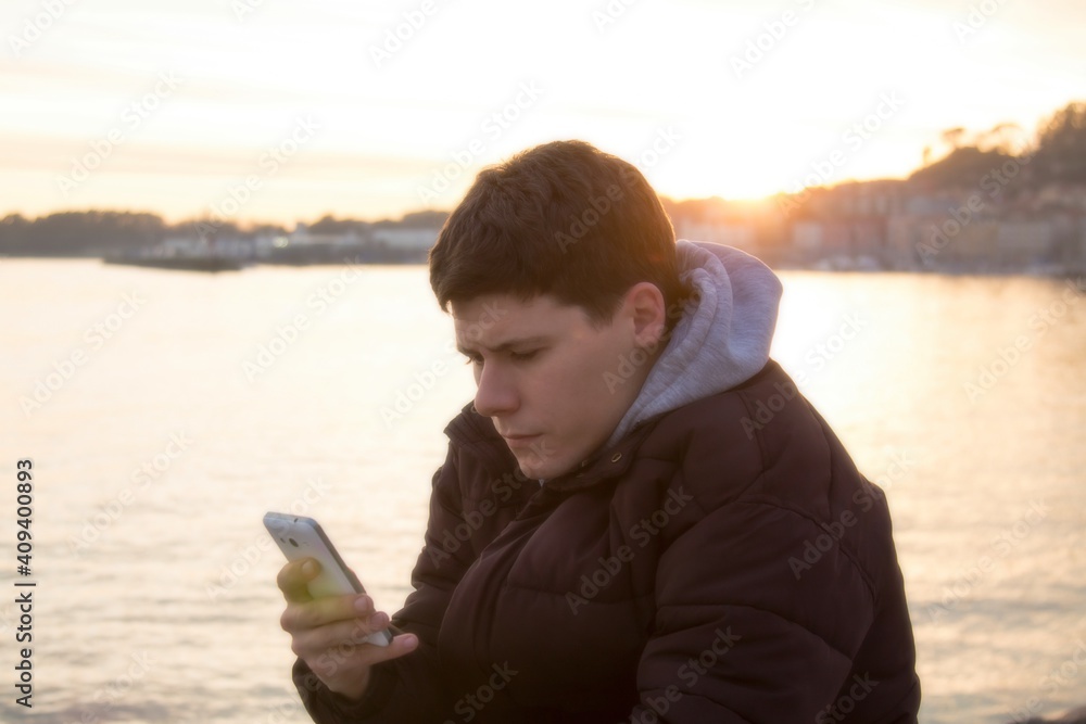 sad or worried man using mobile or smart phone