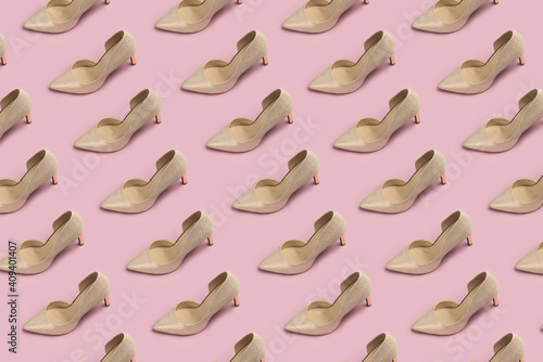 woman shoes heels pattern isolated on pink background.
