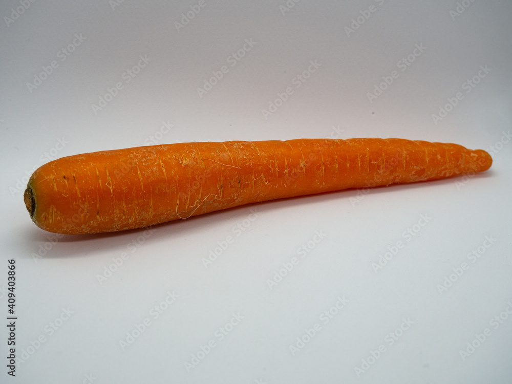 Single carrot horizontally isolated on a white background Single carrot horizontally isolated on a white background