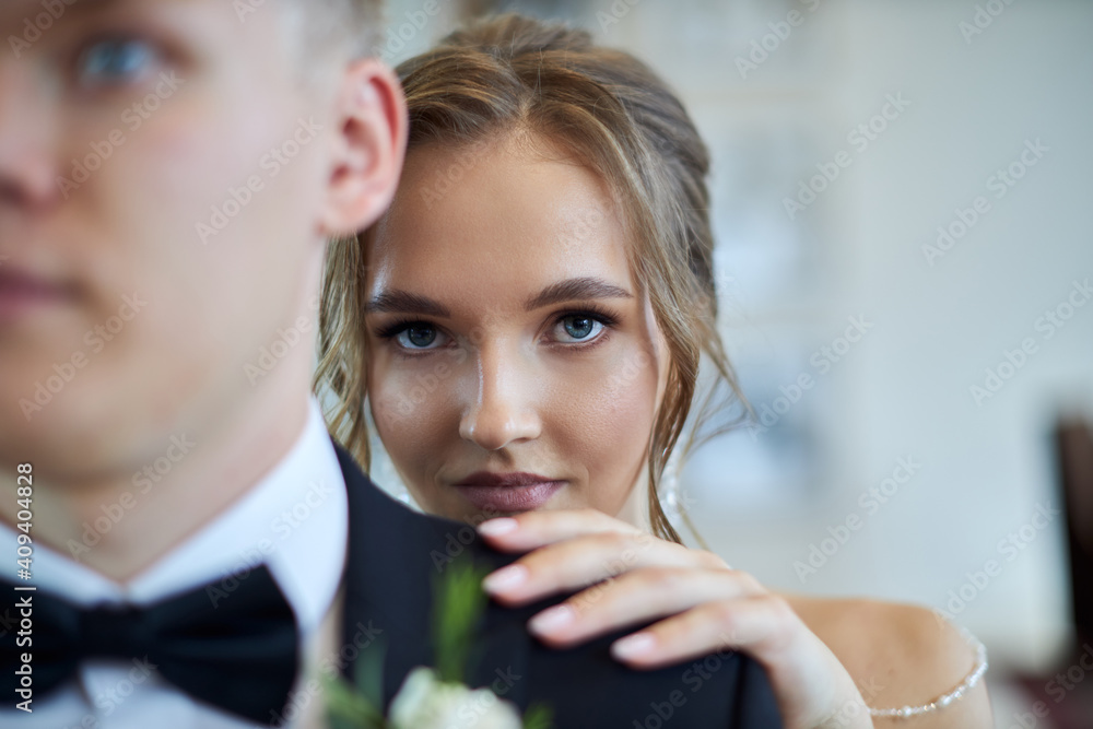 Fototapeta premium bride and groom kissing