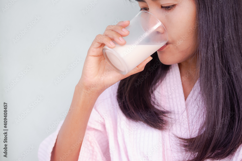 Woman drinking soimilk. hight calcium and protein food. lifestyle lady concept. Woman drinking soimilk. hight calcium and protein food. lifestyle lady concept.