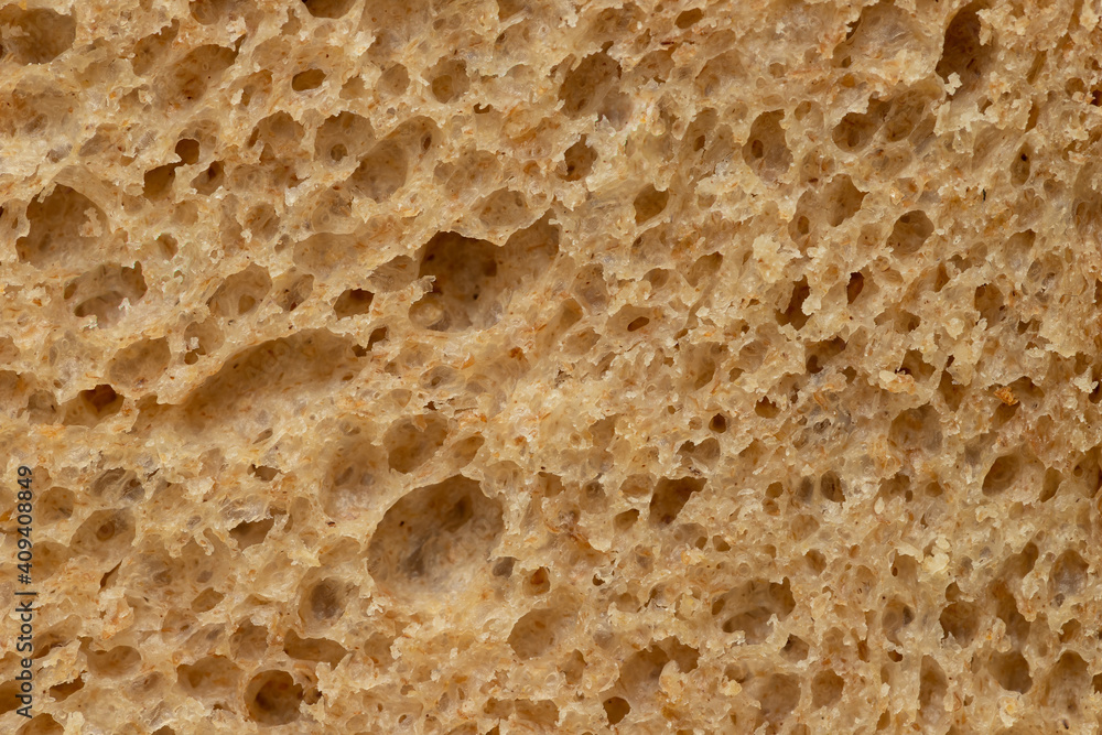 Wheat-rye bread with bran, fresh, sliced.