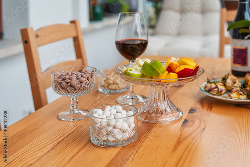 Wine concept. Summer mood. Table with fruits and chocolate