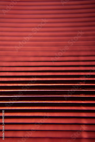 Corrugation minimalism. Corrugated metallized paper close up. Textural background lines