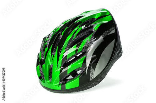 one bicycle helmet in green color on a white isolated background