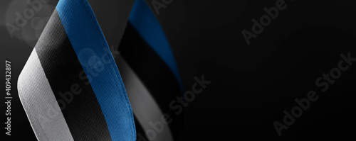 Wallpaper Mural Small national flags of the Estonia on a dark background Torontodigital.ca