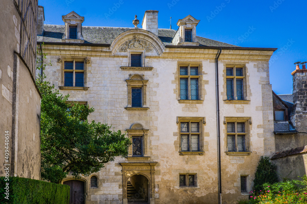 Impressive medieval facade of a rich mansion in the historic center of Bourges, a city located in the Berry Region of France