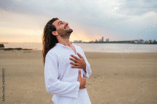 Happy Yoga Man in the Beach