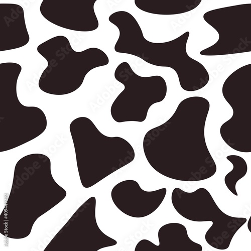 Black and white seamless pattern with cow animal print. Repetitive background with cow or dalmatian dog spots.