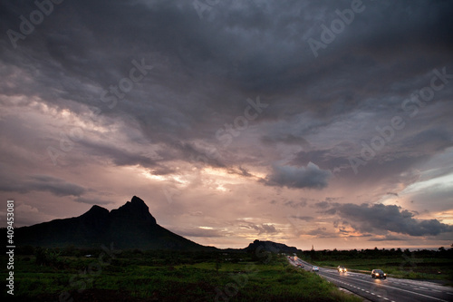 Sunset sky and mountain silhouette in Mauritius. photo