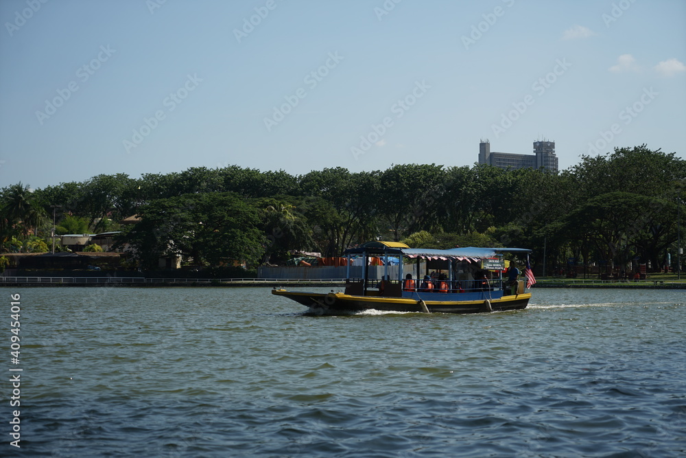 Tour boat on shah alam lake garden.