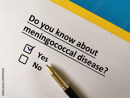 One person is answering question about vaccines. He knows about meningococcal disease. photo