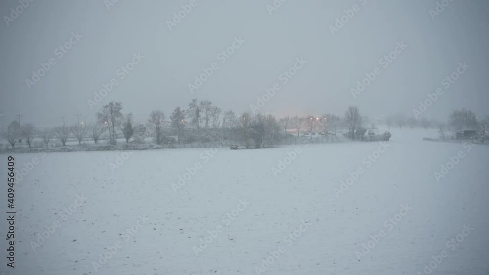 Snowy landscape during snowfall Snowy landscape during snowfall