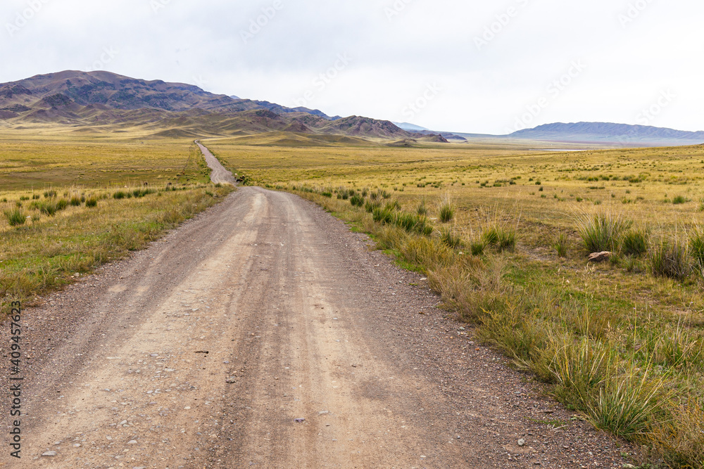 Gravel road in the steppe of Kazakhstan