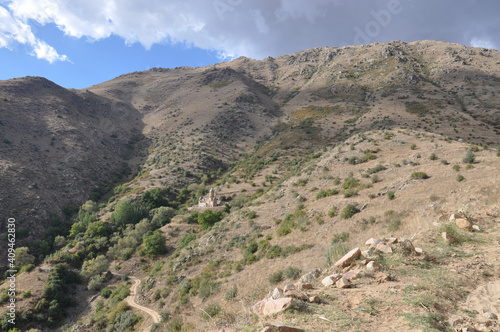 Medieval Christian church in the mountains of the Vayots Dzor region of Armenia in summer