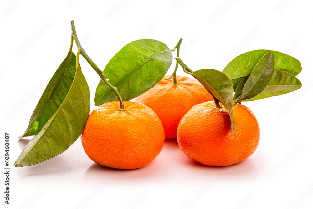 Tangerines with leaves. Tangerine slices. Isolate on white background Tangerines with leaves. Tangerine slices. Isolate on white background