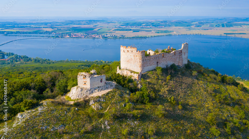 The Devicky castle on Pavlov hills in Palava nature reserve near Nove Mlyny reservoir. Famous landmark on South Moravia. Czech Republic, Central Europe.