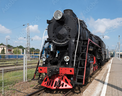 The locomotive of the last century standing under steam