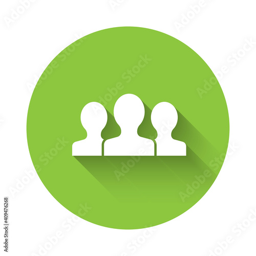 White Users group icon isolated with long shadow. Group of people icon. Business avatar symbol - users profile icon. Green circle button. Vector.