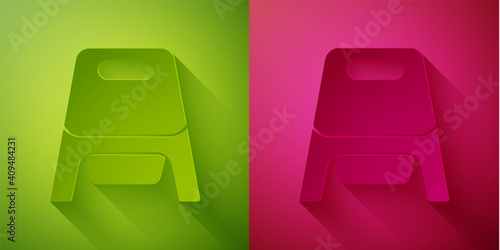 Paper cut Baby potty icon isolated on green and pink background. Chamber pot. Paper art style. Vector.