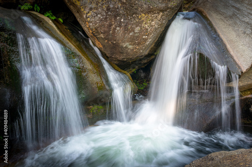 Waterfalls in granite rocks in Sierra de Gredos  Spain. Concept of nature and purity.