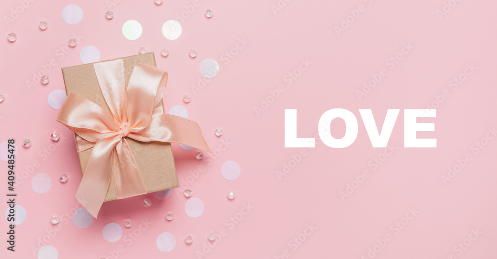 Gifts on pink background, love and valentine concept with text love