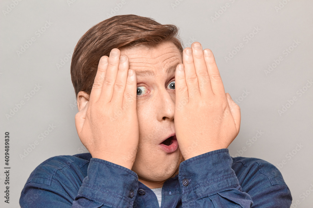 Portrait of surprised impressed man looking at something amazing Portrait of surprised impressed man looking at something amazing