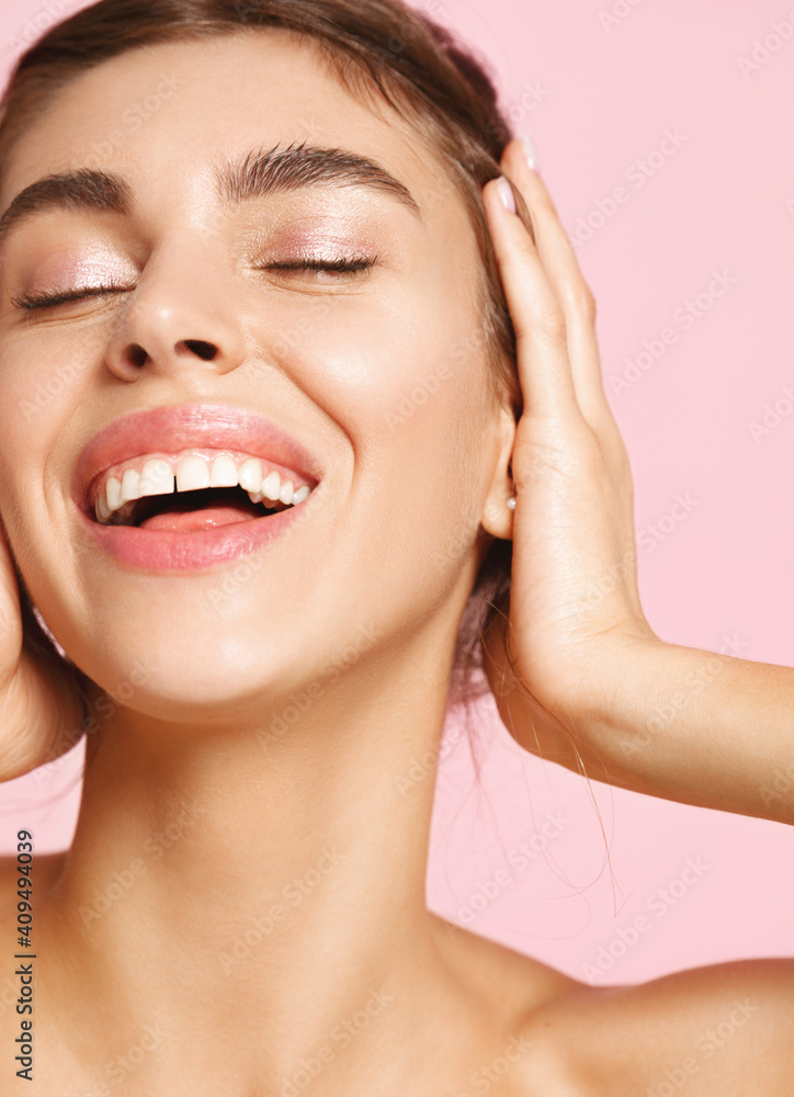 Beauty. Romantic girl smiling and feeling happy on pink background. Young woman with nude makeup, healthy and hydrated skin posing half-naked Beauty. Romantic girl smiling and feeling happy on pink background. Young woman with nude makeup, healthy and hydrated skin posing half-naked