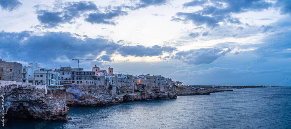 Sunset by the sea in Polignano a Mare in Puglia, Italy Sunset by the sea in Polignano a Mare in Puglia, Italy