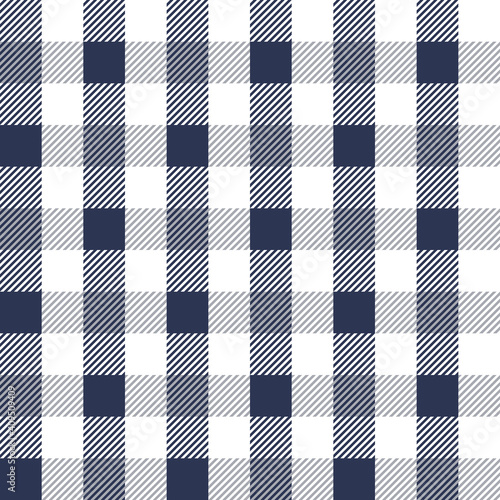 Gingham pattern in navy blue, grey, white. Seamless textured vichy check plaid graphic for dress, blanket, tablecloth, gift wrapping, or other modern spring sumemr autumn fashion textile print. photo