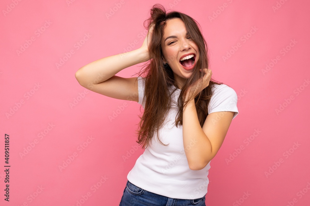 Photo shot of cute nice charming gorgeous attractive pretty youngster happy woman wearing white t-shirt for mockup isolated over colorful background with copy space and having fun Photo shot of cute nice charming gorgeous attractive pretty youngster happy woman wearing white t-shirt for mockup isolated over colorful background with copy space and having fun