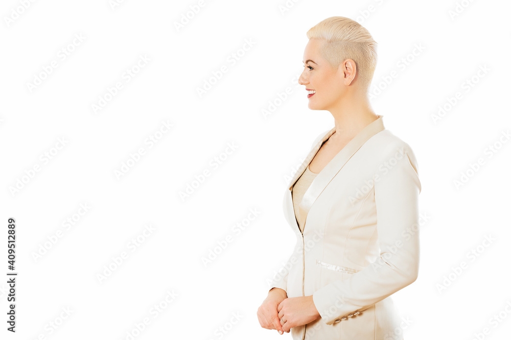 Profile portrait of beautiful stylish woman wearing white jacket, posing in studio on white background, short haircut Profile portrait of beautiful stylish woman wearing white jacket, posing in studio on white background, short haircut
