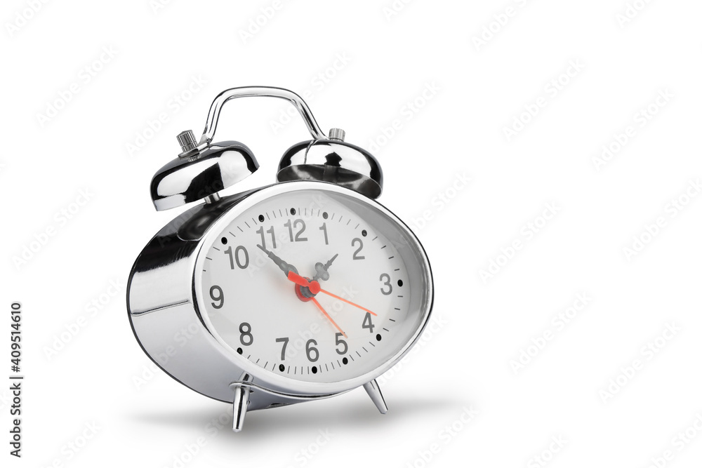 Silver metal alarm clock with second hand, isolated on a white background with shadow Silver metal alarm clock with second hand, isolated on a white background with shadow
