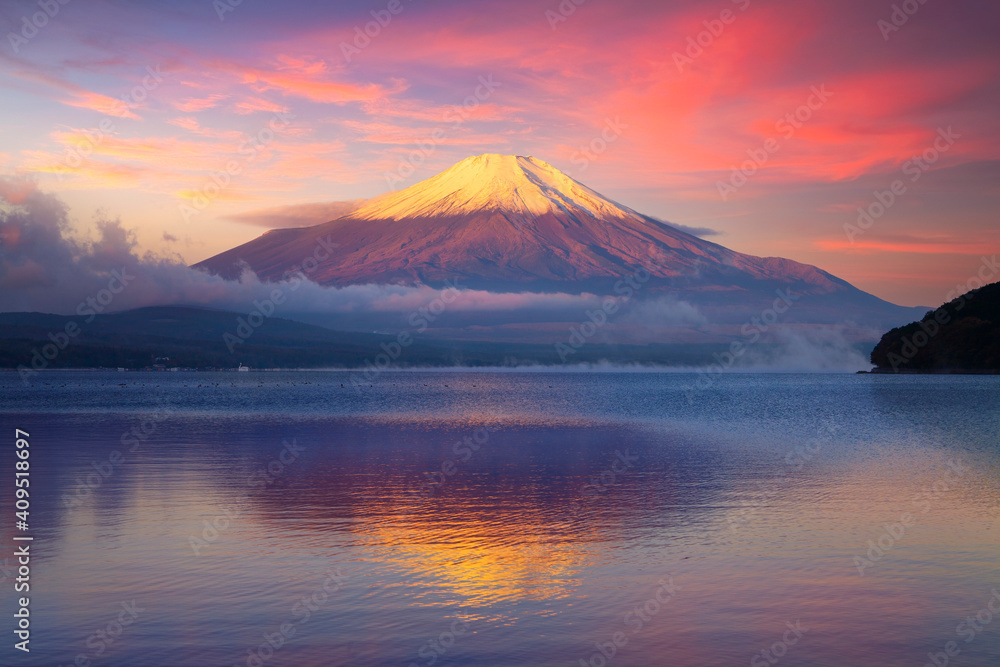 Tranquil scene of mount Fuji and lake yamanaka at sunrise Tranquil scene of mount Fuji and lake yamanaka at sunrise