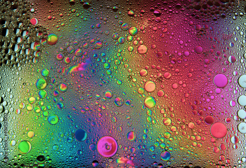 Abstract colorful bubbles. Freeze motion of color dust particles splash. Background image.