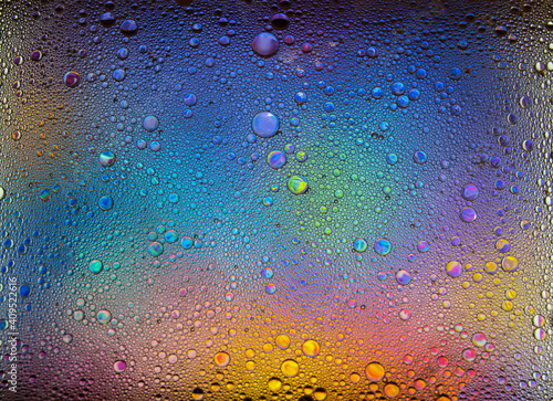 Abstract colorful bubbles. Freeze motion of color dust particles splash. Background image.