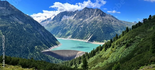 Panoramic view of Alpine lake Schlegeis in the valley Zillertal, Austrian Alps