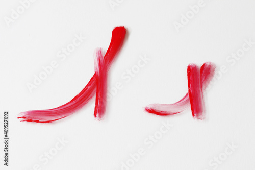 brush painted "x" letter in red colour