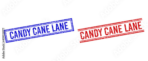 CANDY CANE LANE rubber imprints with grunge style. Vectors designed with double lines, in blue and red colors. Caption placed inside double rectangle frame and parallel lines.