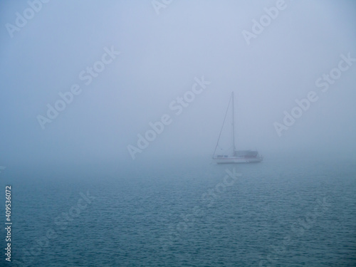 Boat in the fog in the bay of Cadiz capital, Andalusia. Spain. Europe.  © Jose Muñoz  Carrasco