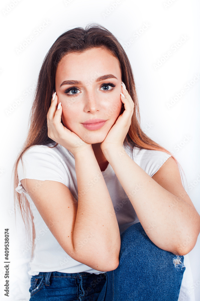 young blond woman on white backgroung gesture thumbs up, isolated emotional posing young blond woman on white backgroung gesture thumbs up, isolated emotional posing