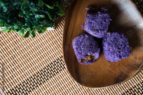 ube suman with sweetened coconut inside photo