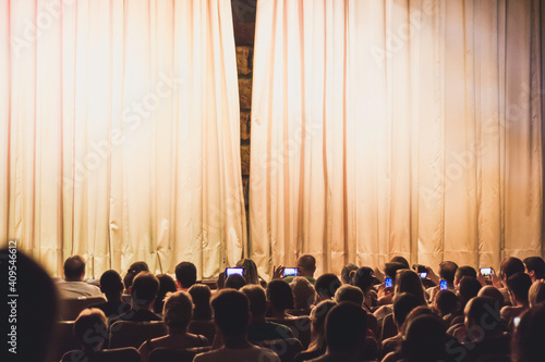 People In The Auditorium Looking At The Stage