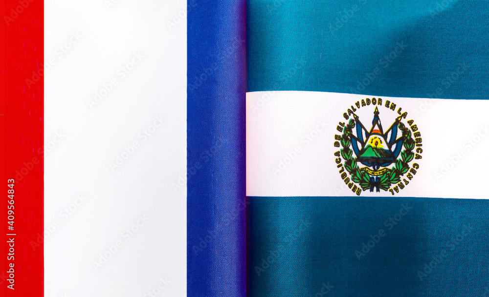fragments of the national flags of France and the Republic of El Salvador close-up