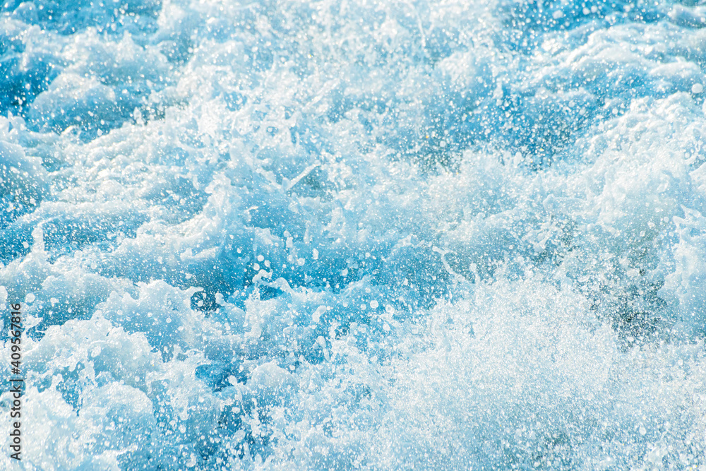 The stream of water splashed on the sea The stream of water splashed on the sea