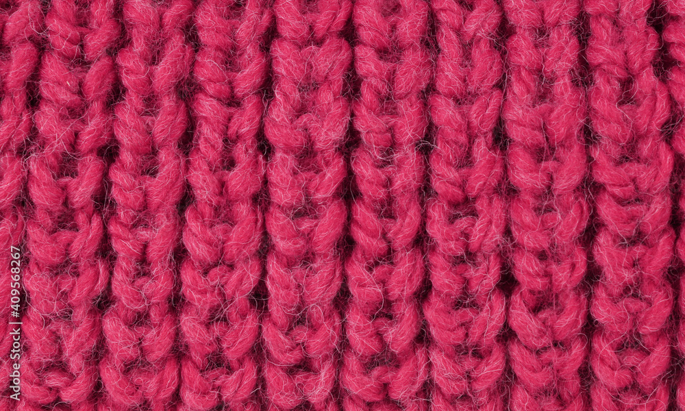 Close up of a knitted wool pattern, soft focus Close up of a knitted wool pattern, soft focus