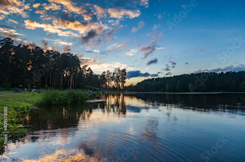 Sunset over the pond in summer